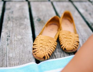 relaxing-shoes-on-wharf-shot-med-12354657